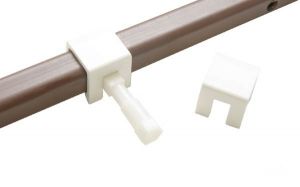 Clamp prevents rotation of extension cords in a 22 x 22 mm pipe